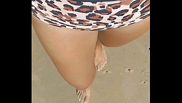 Bikini wetting on the beach