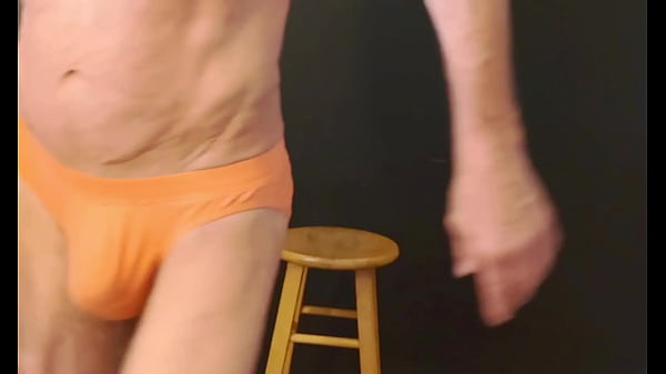 Nonton Part 2 - Down In The Dark - Sneak A Peek Preview - Groin Stretching On The Stool With Dark Background And Bright Briefs - With The Light Off thumbnail