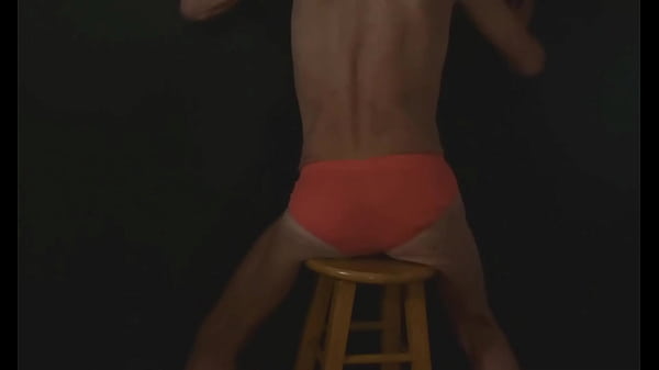 Part 2 down in the dark sneak a peek preview groin stretching on the stool with dark background and bright briefs with the light off 