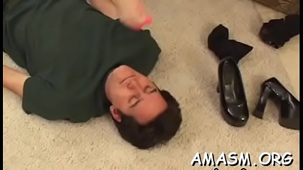 Exquisite girlie is sucking a_faket fang