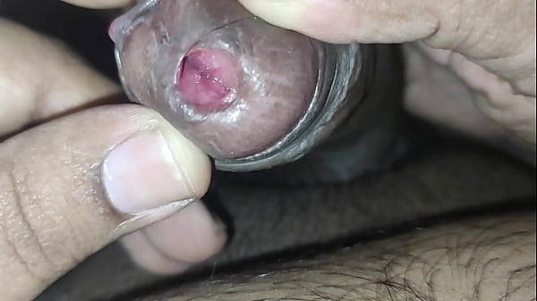 Play with tied foreskin peehole and inserting rod into dick tip 