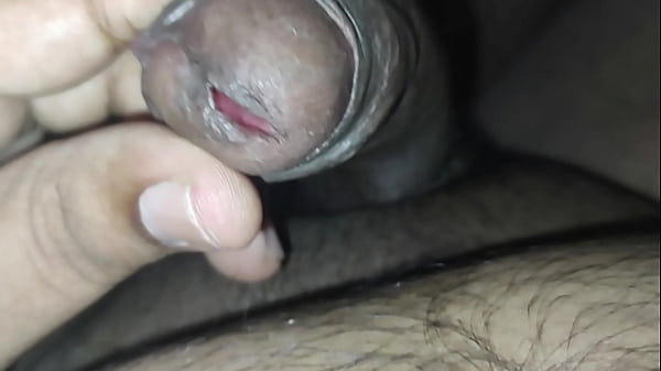 Play with tied foreskin peehole and inserting rod into dick tip