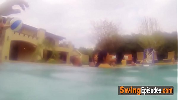 Petite swinger brunette is getting her pussy licked at a_wild pool party!