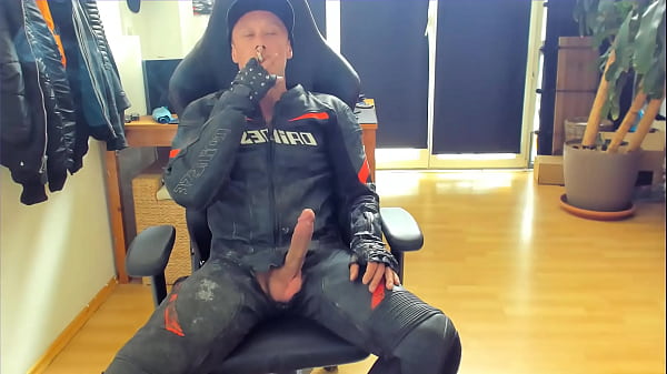 Wanking my cock in my leather gear and getting to a cumshot with some marlboro reds smoking 