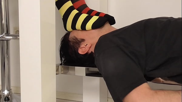 Princess Kirstin Watches Videos On Her Laptop While She Uses Her Slave's Face As A Pad For Her Sweaty Feet In Warm Socks thumbnail