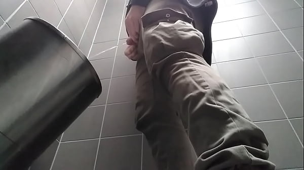 Play MP4 - Young man with uncut dick peeing in a public urinal&period; He then shows and shakes his dick&period;