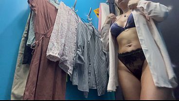 Sexy girl with big tits and ass changing clothes in a public place 