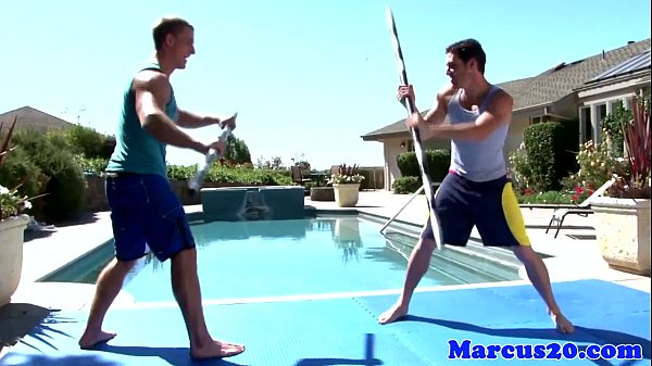 Gay muscular jocks fighting by the pool