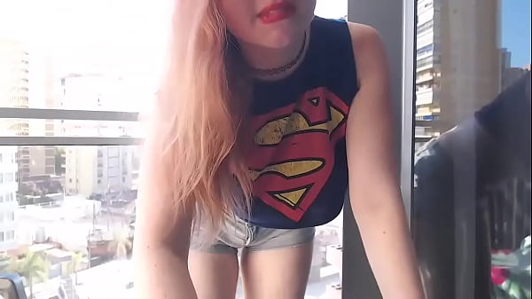 Hot gamer girl clothed flashing in balcony outdoor