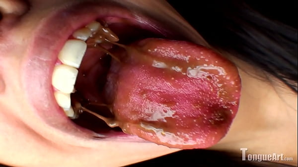 Pixie Shows Her Open Mouth With Peanut Goo thumbnail