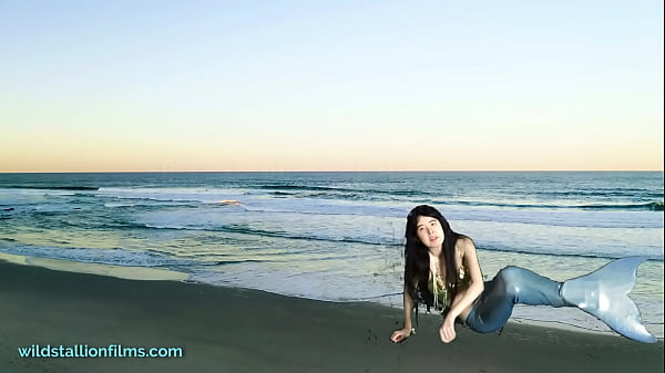 Sexy chinese mermaid surfaces near shanghai 