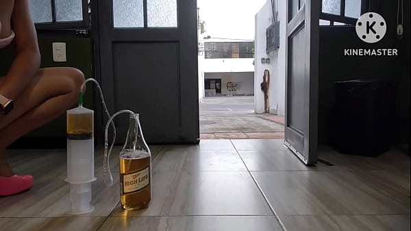 With my boobs out and sexy lingerie, I get a enema with a huge syringe at my open door 