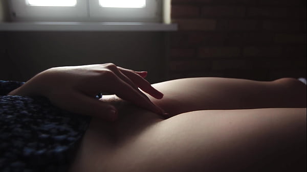 Beautiful teen caresses and slaps her tits and pussy closeup 