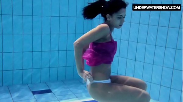Zlata Oduvanchik swims in a_pink topand undresses