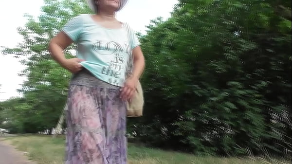 Play MP4 - Hairy mature in transparent dress flashing