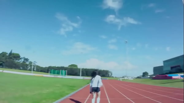 Robot and three women run around 