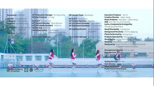 Robot and three women run around 