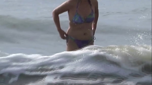 I love showing off_on the beach while my stepson s_friends_masturbate and ask me tofuck