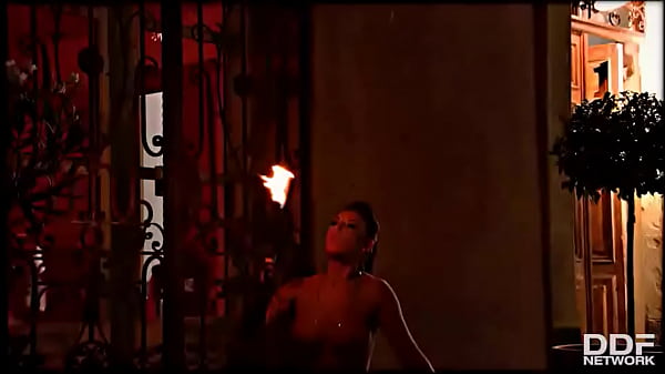 Flaming hot sexy pyromaniac plays with fire 