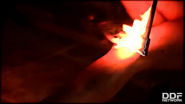 Flaming hot sexy pyromaniac plays with fire