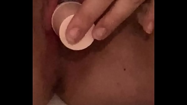 Young girl moans while fucking herself