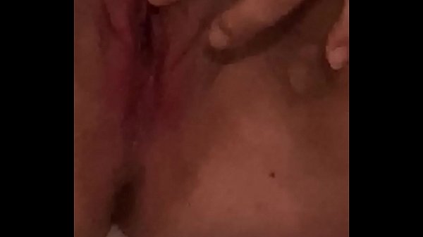 Young girl moans while fucking herself