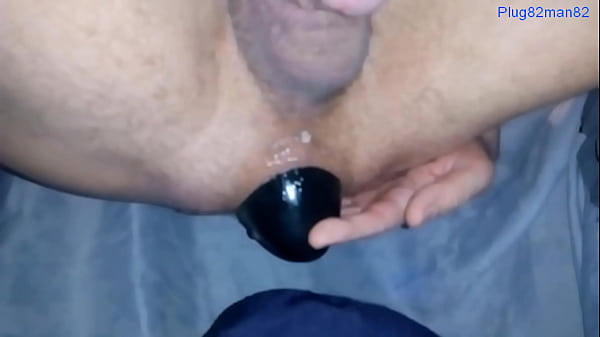 Cumshot without hands.   slow motion video. I insert a huge plug in the back. Diameter of plug at base 10 cm 