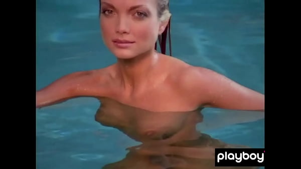 Big boobed blondie Kimberly Holland taking off her sexy uniform outdoor