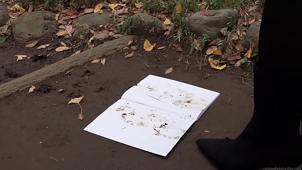Make dirty shoe footprints on a white notebook