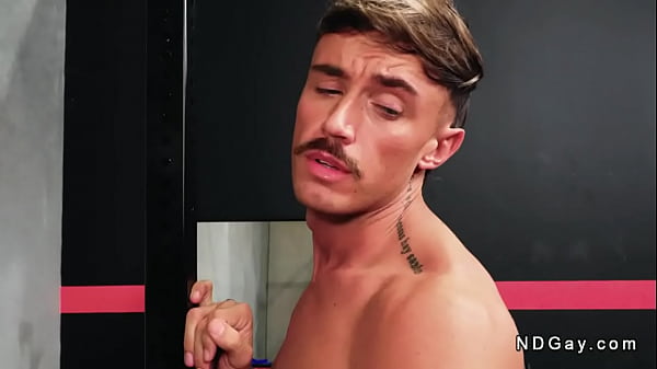 Tattooed Kyle Wyncrest gives blowjob and rimjob to muscle man with mustacious Phoenix Ocean then anal fucks him in reverse cowboy position 