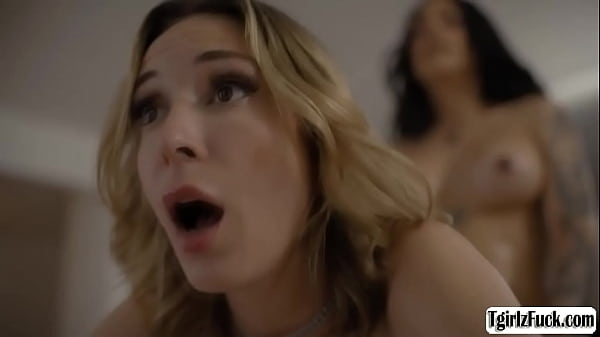 Busty brunette shemale Eva Maxim gets her big tits oils up.The female agent deepthroat blowjobs her ts cock.The trans fucks her pussy on the couch. 