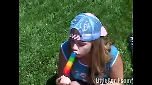 Cute Little AprilOutdoors Sucking A Popsicle
