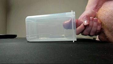 Cumming into container to save for girl friend when she cums home