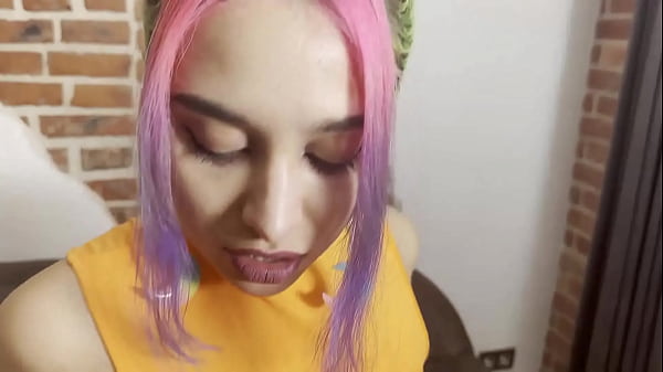 Sexy roxy with colored hair passionately swallows lover's penis