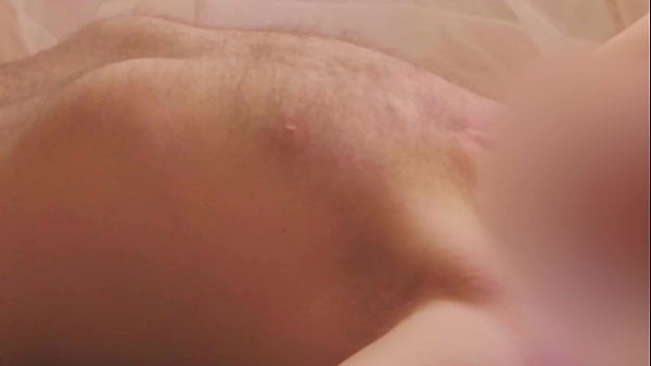 Lying nude in the morning sunlight, panning from head to toe, cinematographic 
