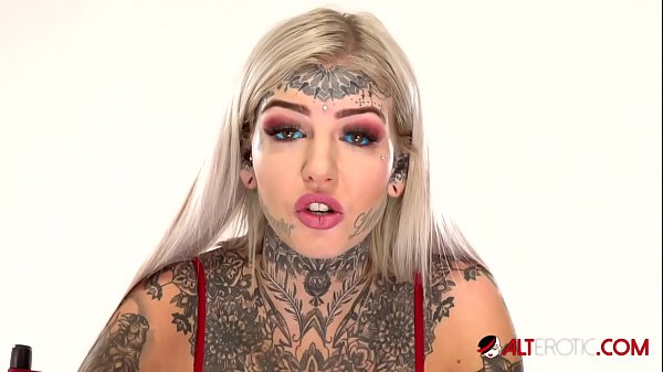 Amber luke aka blue eyes white dragon gets a new 666 face tattoo