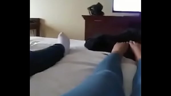 two pretty feet in hotel room