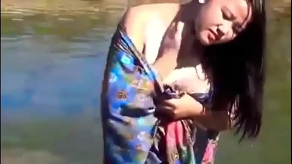 Girl Enjoying in River at_jungle