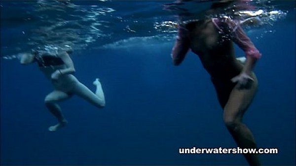 Nastya and Masha are swimming nude in the sea 