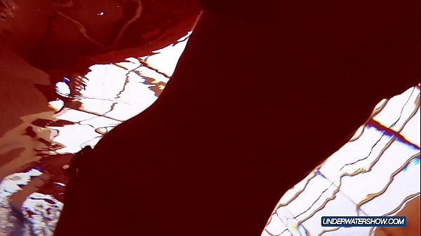 Redhead in blue bikini_showing her body