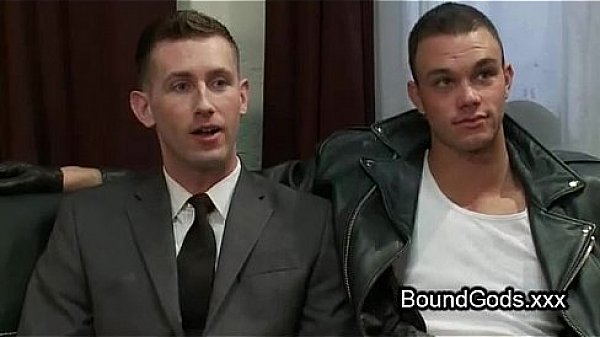 Suspended gay gets his dick jerked off 