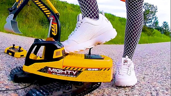 Big_excavator is destroyed_kicked toycrush_plastic_car jumps smashes car trample trampled crushed smashed crushed broken plastic car crush_toy car_sneaker_toy toycrush plastic car_jumps smashes car trample