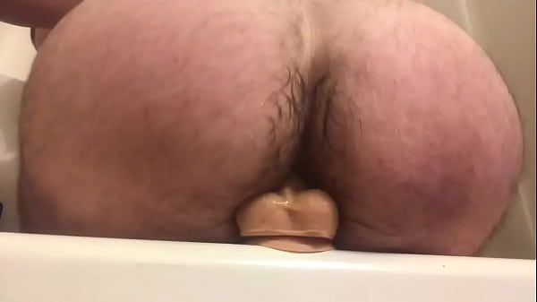 Booty bouncing and jiggling while the dildo goes in and out
