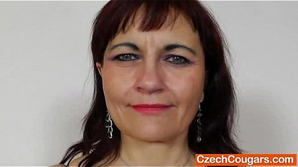 Redhead Remy sucks her fake cock at home 