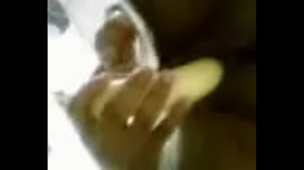 Thot sticking a banana in her pussy