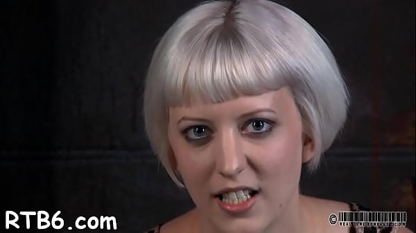 Engaging blonde woman is_slowly taking off_her sexy lingerie