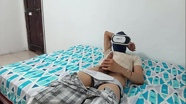 Masturbator masturbates while watching porn in his VR headset 