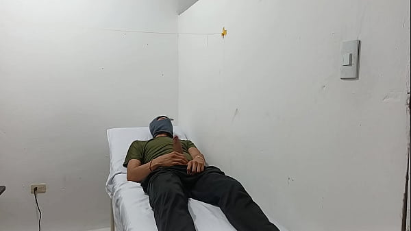 Kinky doctor masturbates his cock in the office 