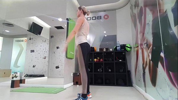 Cute blonde teen doingwarmup_at the gym