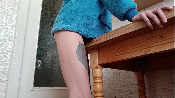 Play MP4 - Skinny brunette rubs her pussy on the table in the kitchen